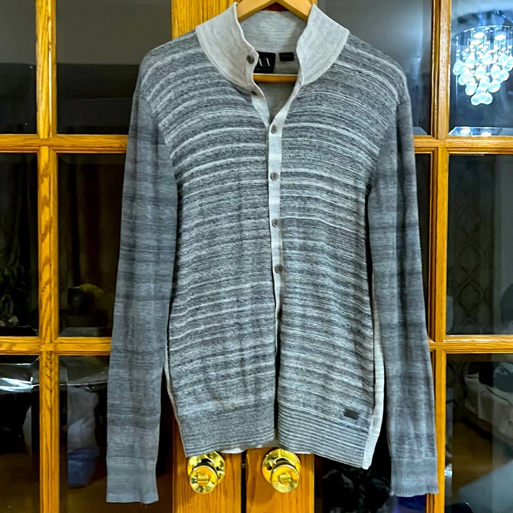Armani Exchange button up sweater with pockets, size medium in great condition.